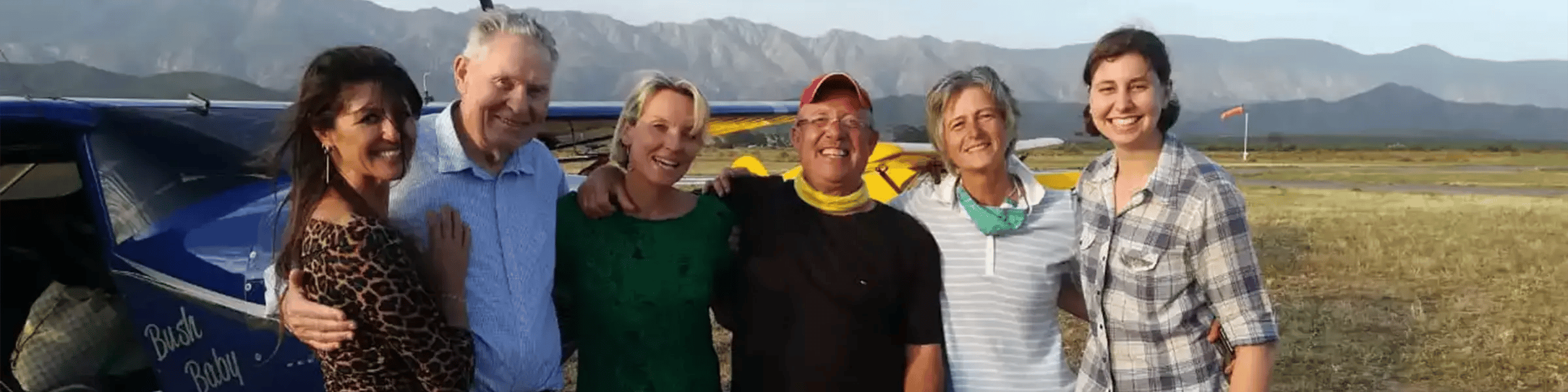 Jim with family and friends in front of aircraft